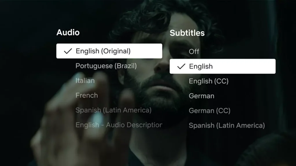 Menu de áudio e legendas da Netflix aberto na tela mostrando opções de idioma.